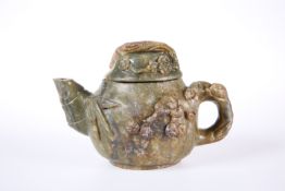 A CHINESE CARVED HARDSTONE TEAPOT