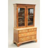 AN EARLY 18TH CENTURY FEATHERBANDED WALNUT CABINET ON CHEST