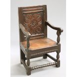 A 17TH CENTURY OAK WAINSCOT CHAIR