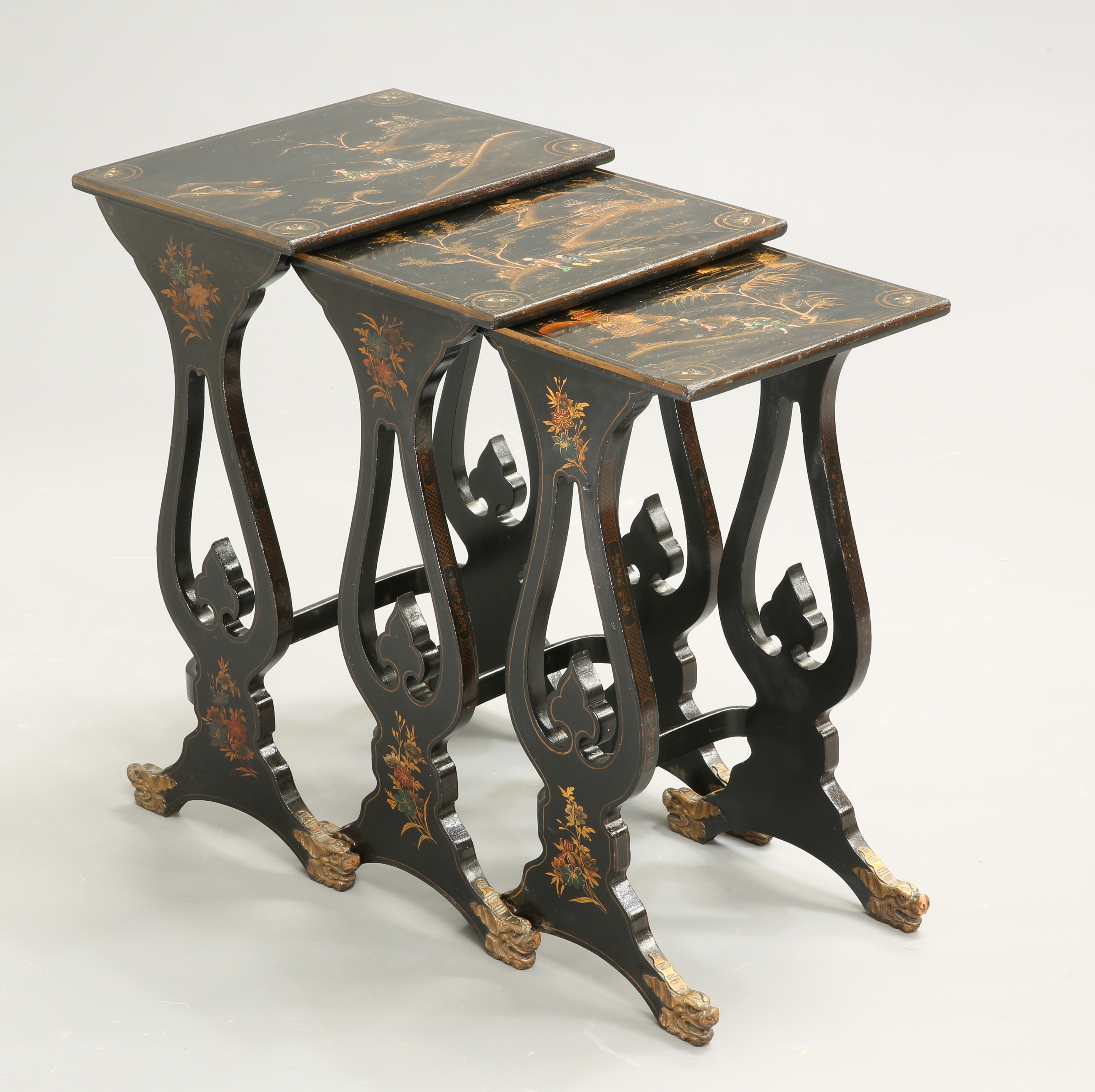 A SET OF THREE CHINESE LACQUER NESTING TABLES