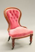 A VICTORIAN MAHOGANY SPOON-BACK CHAIR