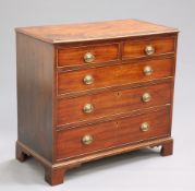 A GEORGE III MAHOGANY CHEST OF DRAWERS