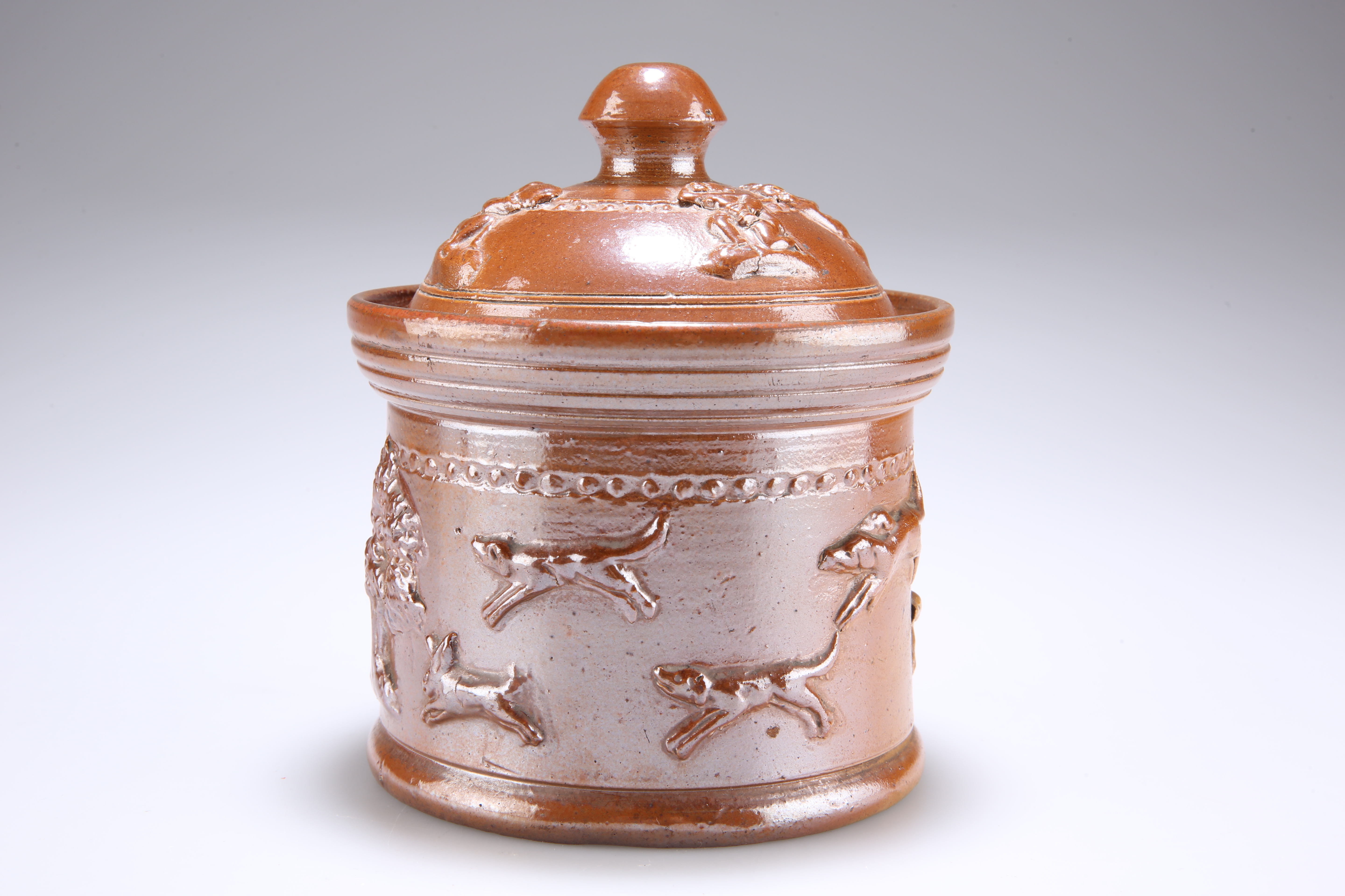 A 19TH CENTURY SALT-GLAZED STONEWARE TOBACCO JAR