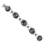 A STEPHEN WEBSTER 18CT BRACELET SET WITH DIAMONDS, HAEMATITE AND GREY HARDSTONES