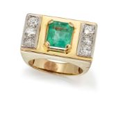 AN EMERALD AND DIAMOND RING