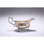 A GEORGE III PROVINCIAL SILVER SAUCE BOAT