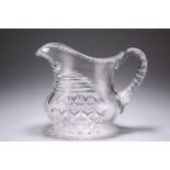 A MID-19TH CENTURY CUT-GLASS WATER JUG, boat-shaped, with hobnail cutting to the lower body. 18cm