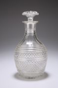 A GEORGIAN CUT-GLASS DECANTER, the ovoid body heavily cut with hobnail and banding. 24.5cm high