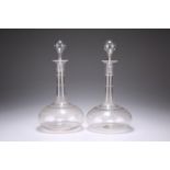 A PAIR OF JAMES POWELL ETCHED GLASS DECANTERS AND STOPPERS, each of bottle-form and decorated with