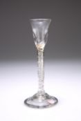 A CORDIAL GLASS, the long stem with airtwist and domed foot. 15cm Provenance: The Chris Crabtree