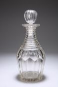 A VERY HEAVY VICTORIAN DECANTER AND STOPPER, mallet-shaped, with panel-cut body and heavy steps to