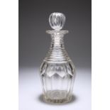 A VERY HEAVY VICTORIAN DECANTER AND STOPPER, mallet-shaped, with panel-cut body and heavy steps to