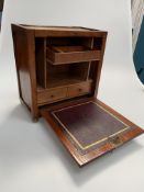 An early 20th Century fall-front table desk