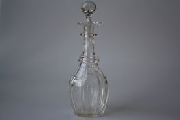 A CUT-GLASS BARREL-SHAPED DECANTER