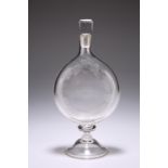 A UNUSUAL GLASS FLASK, CIRCA 1800, the moon-shaped flask engraved with fruiting vine and the