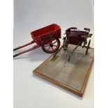 A model of an Offord Governess Cart, on a plinth base with brass plaque inscribed 'Offord