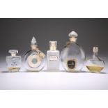 A COLLECTION OF VINTAGE GLASS PERFUME BOTTLES, including Dior (boxed), Guerlain and Caron. (5)