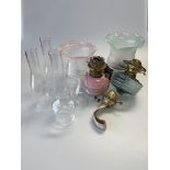 Group of oil lamp parts inc. two tinted shades, funnels, two burners with reservoirs, etc.