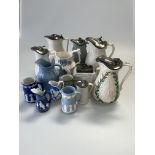 A group of moulded and sprigged jugs, 19th Century and later, inc. Aesthetic teapot (14)