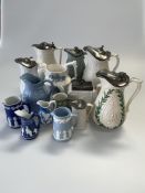 A group of moulded and sprigged jugs, 19th Century and later, inc. Aesthetic teapot (14)