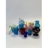 Fifteen pieces of Victorian and later glass inc. pressed coloured glass cream jugs, slag glass cream