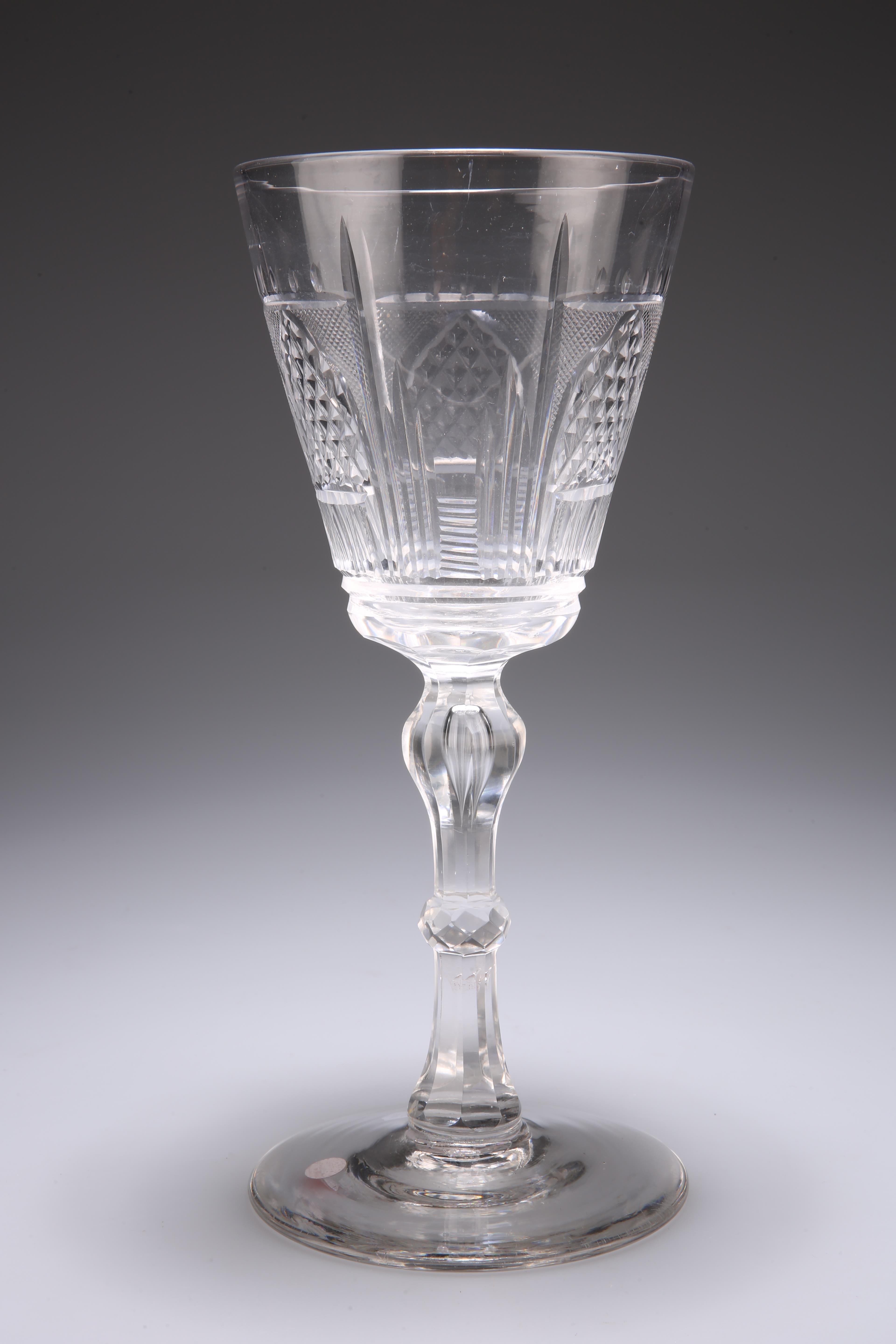 A VERY LARGE CUT-GLASS GOBLET, PROBABLY A TOASTING GLASS, 19TH CENTURY, the tapering bowl with