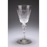 A VERY LARGE CUT-GLASS GOBLET, PROBABLY A TOASTING GLASS, 19TH CENTURY, the tapering bowl with