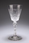 A VERY LARGE CUT-GLASS GOBLET, PROBABLY A TOASTING GLASS, 19TH CENTURY, the tapering bowl with