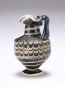 A RARE GREEK CORE-FORMED GLASS OINOCHOE, CIRCA 1ST-4TH CENTURY BC