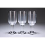 A SET OF THREE LATE VICTORIAN SHERRY OR SPARKLING WINE GLASSES, each with deep cylindrical bowl,