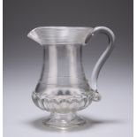 AN ENGLISH GLASS COIN JUG, EARLY 19TH CENTURY, moulded rings to the flared neck rim. 11.4cm high