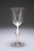 A LARGE ALE GLASS, CIRCA 1775, the bell-shaped bowl slightly slanted wrythens to the lower