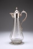 A LATE VICTORIAN SILVER-PLATE MOUNTED CLARET JUG, the mount with mask-cast spout and scrolling
