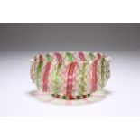 A MURANO GLASS BOWL, probably late 19th Century, circular with with stripes and twists of red,