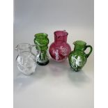 Four pieces of Victorian Mary Gregory glass inc. cranberry jug, green vase, etc. (4)