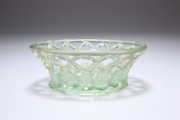A MURANO GLASS DISH, circular open lattice work design, the green glass with slight iridescence,
