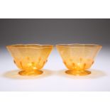 A PAIR OF MURANO GLASS BOWLS, the octagonal orange bodies with teadrops, raised on a folded foot