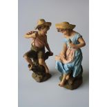 A PAIR OF GOLDSCHEIDER TERRACOTTA FIGURES