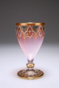 A FINE MOSER ENAMELLED AND "JEWELLED" GLASS GOBLET, the pink/opaline shaded glass picked out with