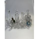A group of glass inc. heavy cut-glass decanter of oval-section, heavy cut-glass decanter of tapering