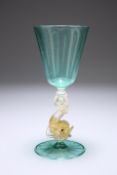 A VENETIAN SALVIATI WINE GLASS, the turquoise bowl raised on a dolphin-form stem with gold flecking,