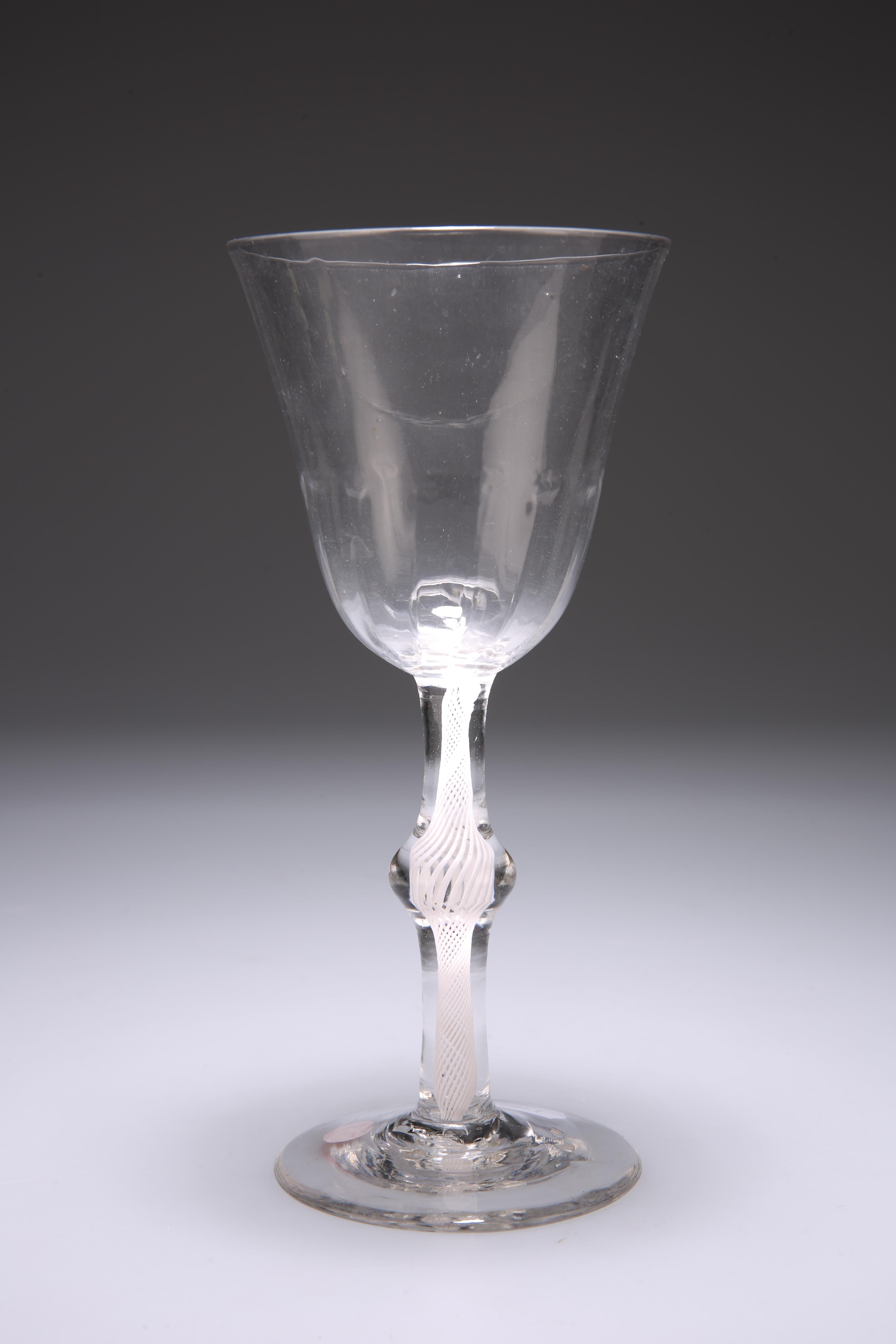 A LARGE ALE GLASS, CIRCA 1775, the bell-shaped bowl slightly slanted wrythens to the lower - Image 2 of 2