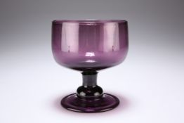 A GEORGIAN AMETHYST GLASS RUMMER OR SWEETMEAT DISH, late 18th Century, with folded foot. 12.2cm