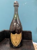 1 BOTTLE CHAMPAGNE DOM PERIGNON VINTAGE 1964 (2 cms. inverted) there is no evidence of seepage –