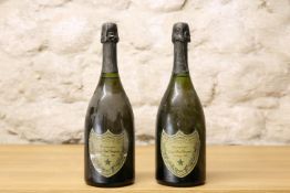 2 BOTTLES CHAMPAGNE CUVEE DOM PERIGNON 1980 – levels both at 1cm inverted – minor cellar soiling