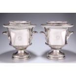 A PAIR OF GEORGIAN SILVER-PLATED WINE COOLERS, of tapered cylindrical form, the removable beaded rim