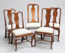 A GROUP OF FIVE EARLY 18TH CENTURY WALNUT SIDE CHAIRS, each with solid shaped splat and cabriole