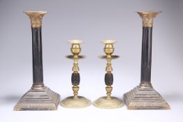 ~ A PAIR OF 19TH CENTURY GILT-BRASS AND LACQUERED CORINTHIAN COLUMN CANDLESTICKS, each with
