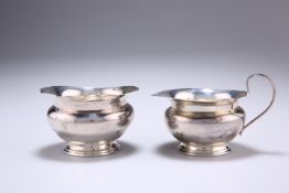 A GEORGE V SILVER CREAM JUG AND SUGAR BOWL, by Atkin Brothers, Sheffield 1921, squat form with