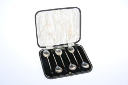 A CASED SET OF SIX SILVER COFFEE SPOONS, by Viner's Ltd, Sheffield 1933, with black plastic coffee